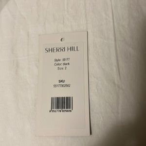 Black, size 2, excellent condition, sherry hill $500+ original price, worn once